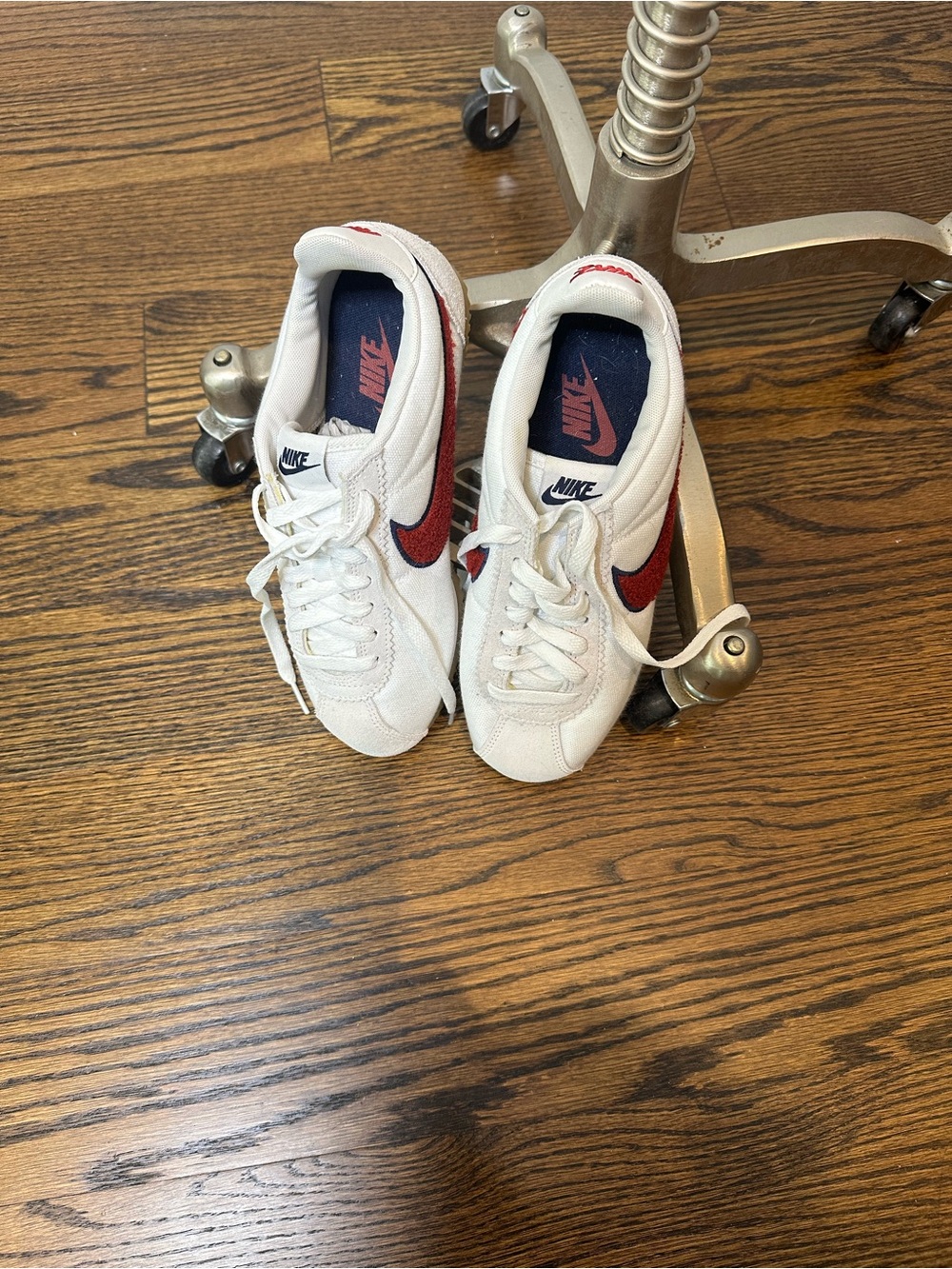 Nike Kids White Sneakers with Red Swoosh and Navy Insole